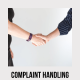 Two People shaking hands. Course image for complaints handling.